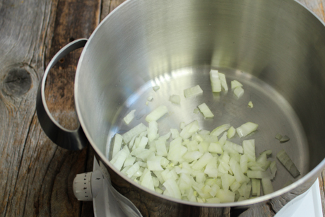 4. Fry onions in a large pot over medium-high heat with vegetable oil until cooked. About 5-7 minutes.