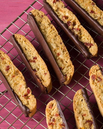 Chocolate dipped biscotti on a wire cooling rack