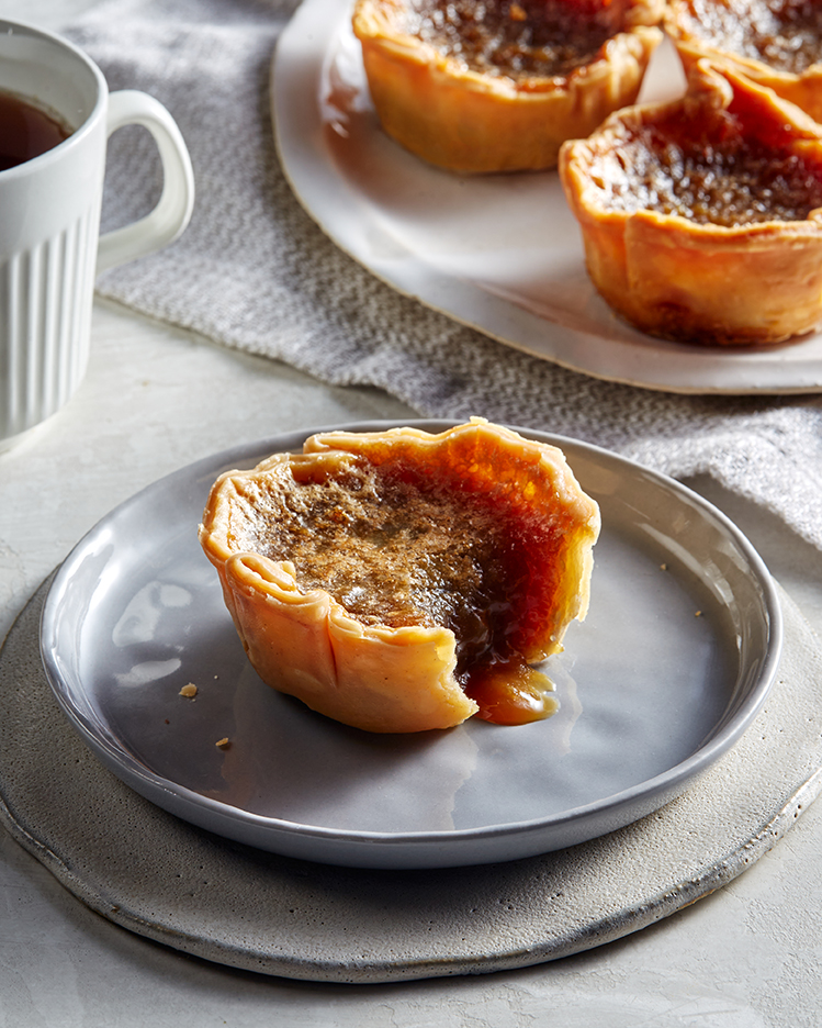 Classic butter tarts on a serving dish