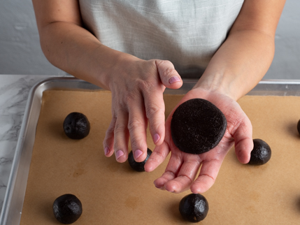 Flattened ball of dark chocolate cookie dough