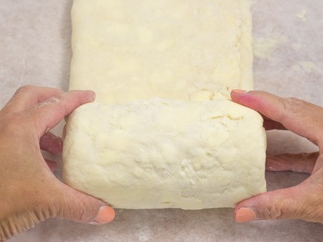 Roll up of the puff pastry dough