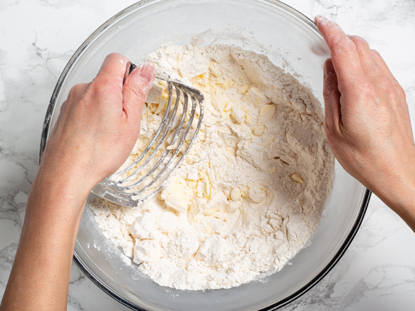 Cutting butter into flour with a pastry blender