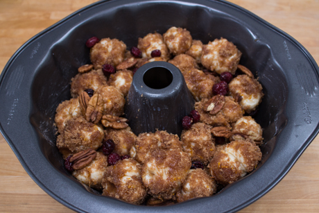 20. Layer in bundt pan with cranberries and pecans