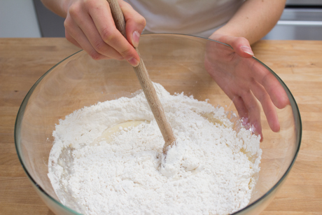7. Stirring flour into yeast mixture