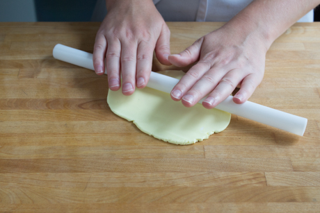 12. To make a cut-out for the teapot that will be placed on the cupcake roll a larger piece of fondant out and cut shapes with your favourite cookie cutter.
