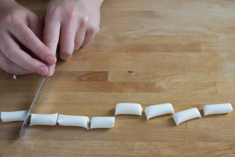 1. Roll fondant into a long medium-think line and cut into one inch pieces.