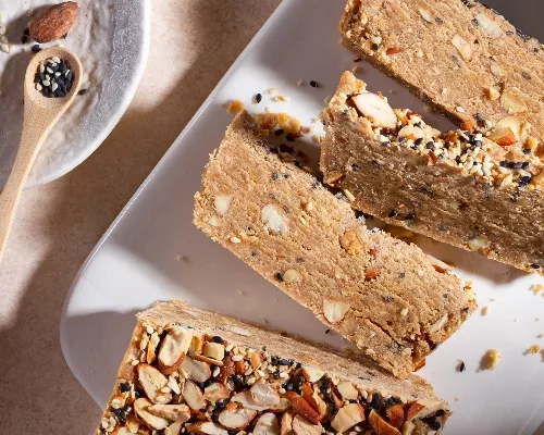 Slices of almond halva on a platter