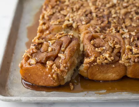 Apple, Walnut, and Caramel Buns on a baking sheet