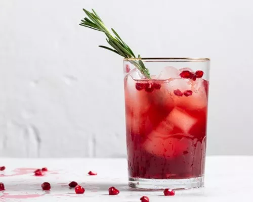 Pomegranate Rosemary Holiday Cocktail in a glass