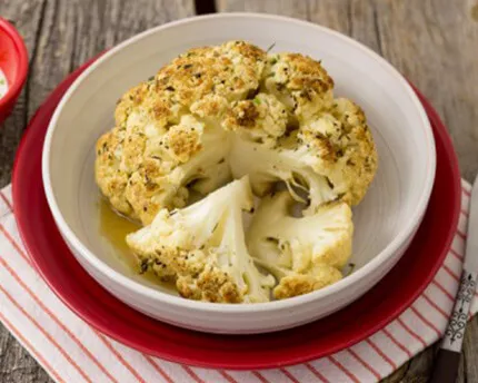 Herb Roasted Cauliflower sitting in a white bowl