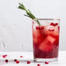Pomegranate Rosemary Holiday Cocktail in a glass