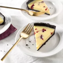 White Chocolate Raspberry Swirl Tart with a Dark Chocolate Crust