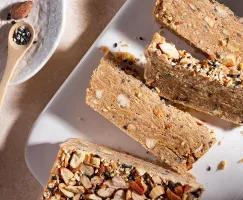 Slices of almond halva on a platter