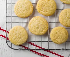 Lemon sugar cookies on a wire cooling rack