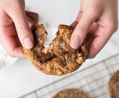 S'mores cookies pulled apart with two hands