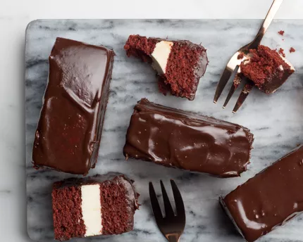 Chocolate Dipped Red Velvet Cake Bars with Swiss Buttercream Frosting